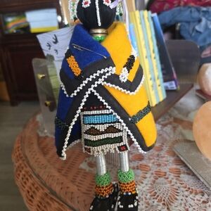 Beaded Doll with Colorful Blanket